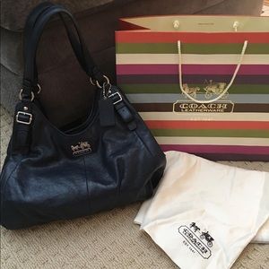 This beautiful COACH purse is like new!